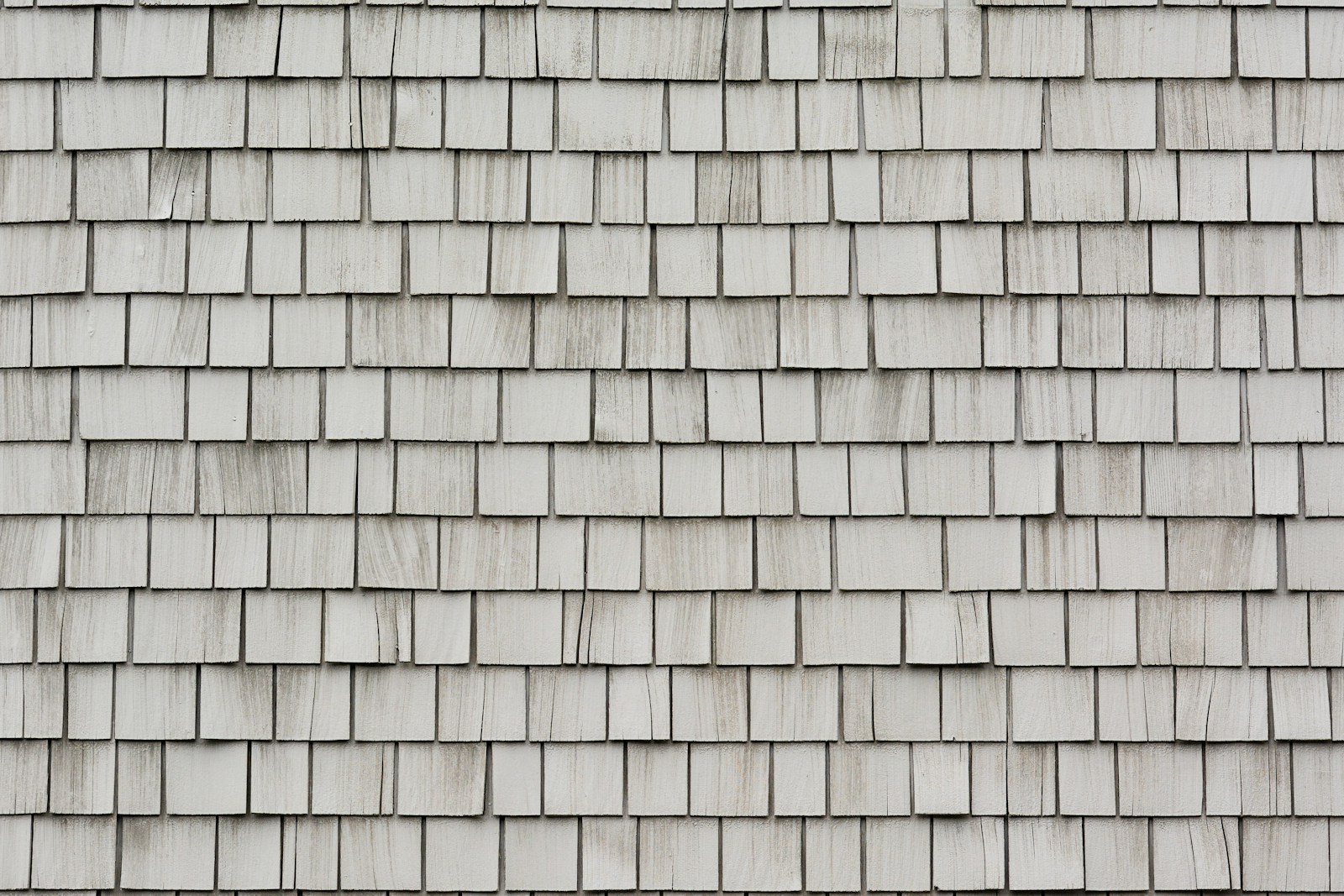 Close-up texture of pale wooden roof shingles
